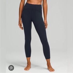 Lululemon’s InStill High Rise Pant 25”. Size 10